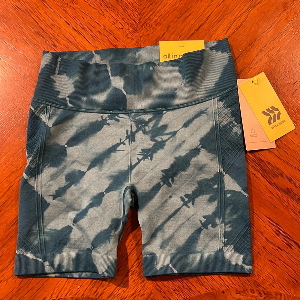 All in motion athletic tight fitting blue tie dye shorts.